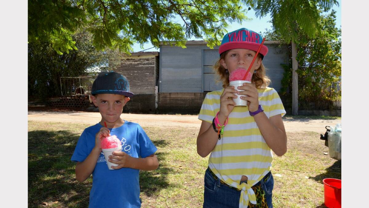 Alex and Brook Wilson enjoy sno-cones on a summer day.