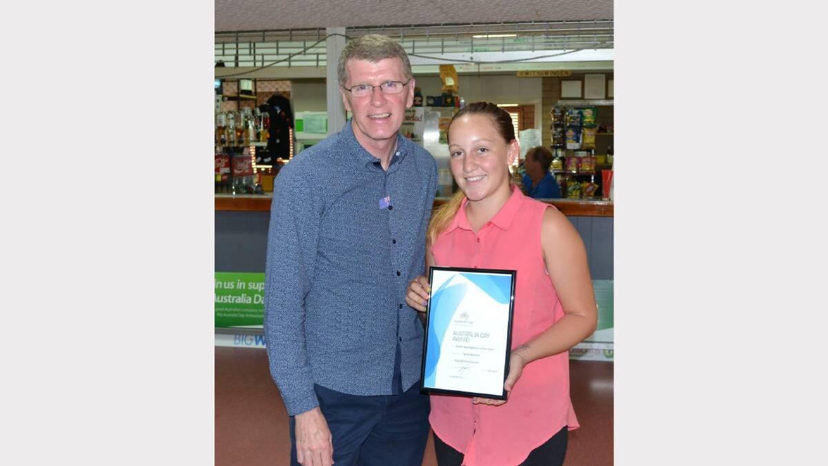 Tingha's Junior Sportsperson of the Year is Tahlia Roberts with John Watkins.