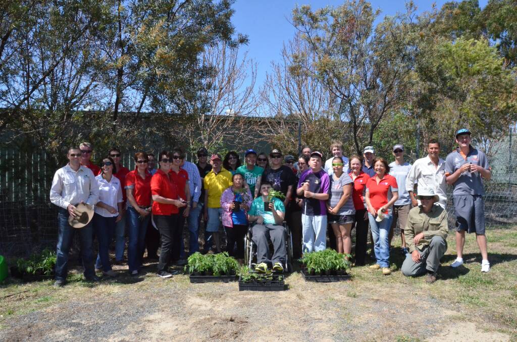 Coming together for a good cause at the Best Food Garden include staff from Best Employment, Best Tree Tenders and clients and staff of Connections, Inverell.