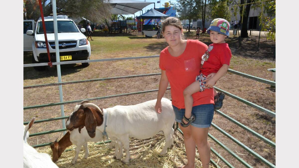 Chantell Sly and Aziya Colby checked out Graeme Wright's goats on display.