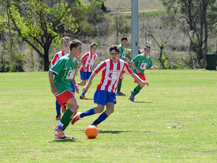 Portugal and Paraguay face off on an Inverell pitch.