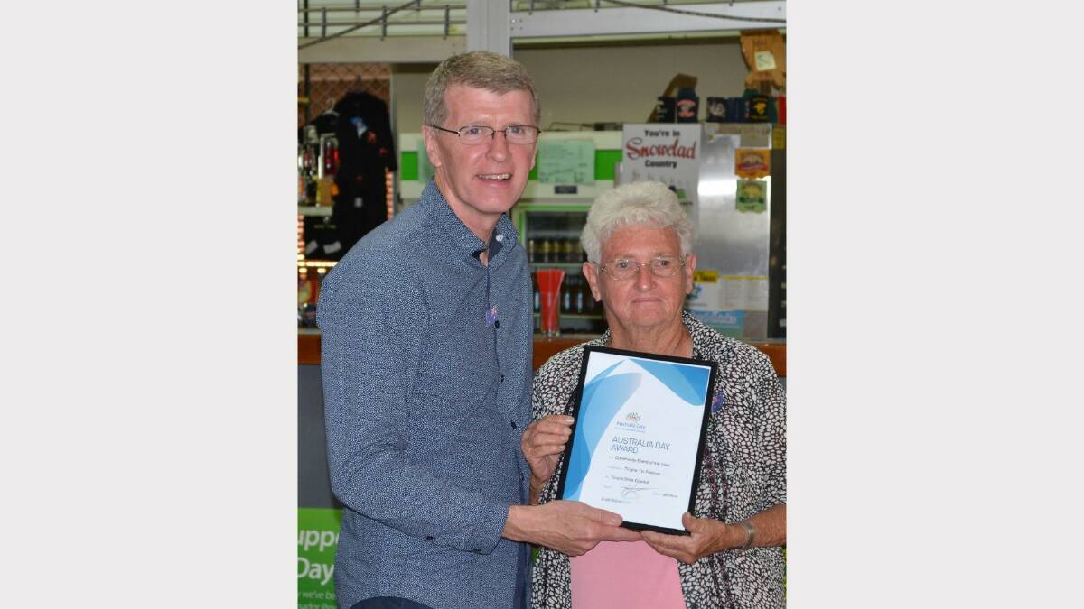 Betty Grant from the Tingha Citizens Association Inc. accepted the award for the Community Event of the Year-the Tingha Tin Festival. She is pictured with John Watkins.