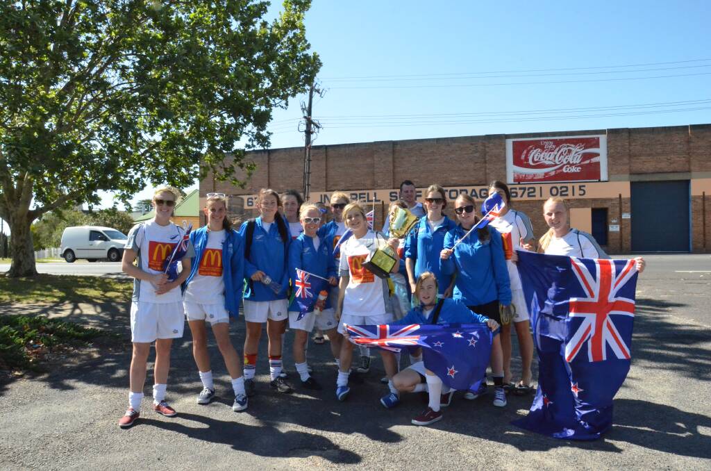 Returning champs New Zealand spent time parading their cup around Inverell's CBD on Friday before they played Japan in the final.