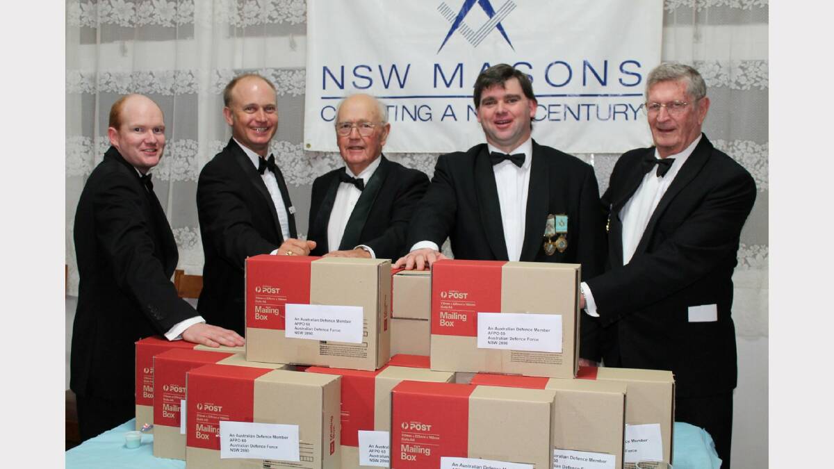 Local members of Inverell's Masonic Lodge, Raymond Roberts, David Tait, Ian Davidson, Andrew Hodkinson and Vic Finney with care packs for Aussie troops serving overseas.