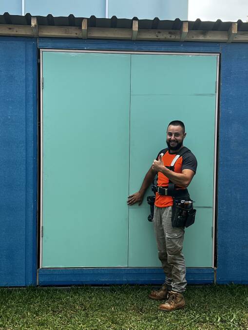 On the job: Jimmy Rizk works as a carpenter in the Illawarra. Picture: Supplied