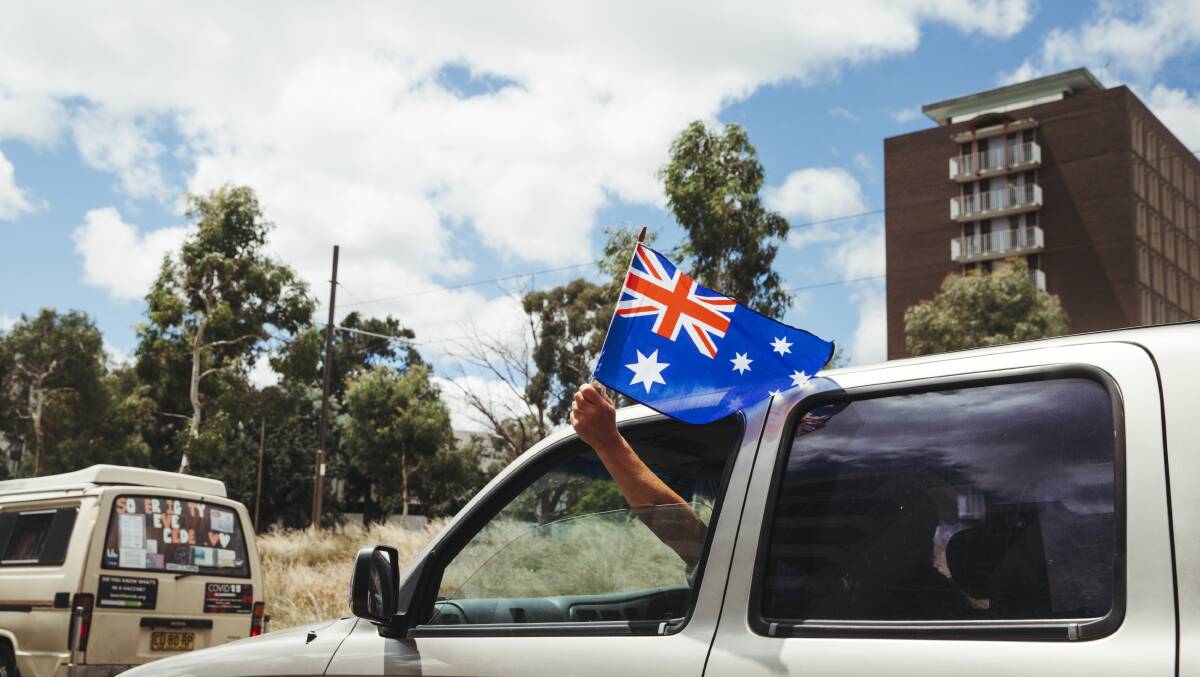 A protester on Northbourne Avenue. Picture: Dion Georgopoulos