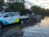 Professor Bradley Eyre loading the University research boat from Lismore flood waters.