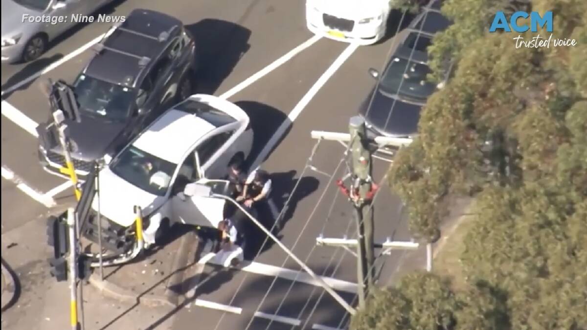 Police arrest two people in an alleged car chase in Sydney. Picture via Nine News