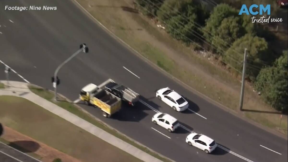 A white sedan drives in the opposite lane in Sydney. Picture via Nine News