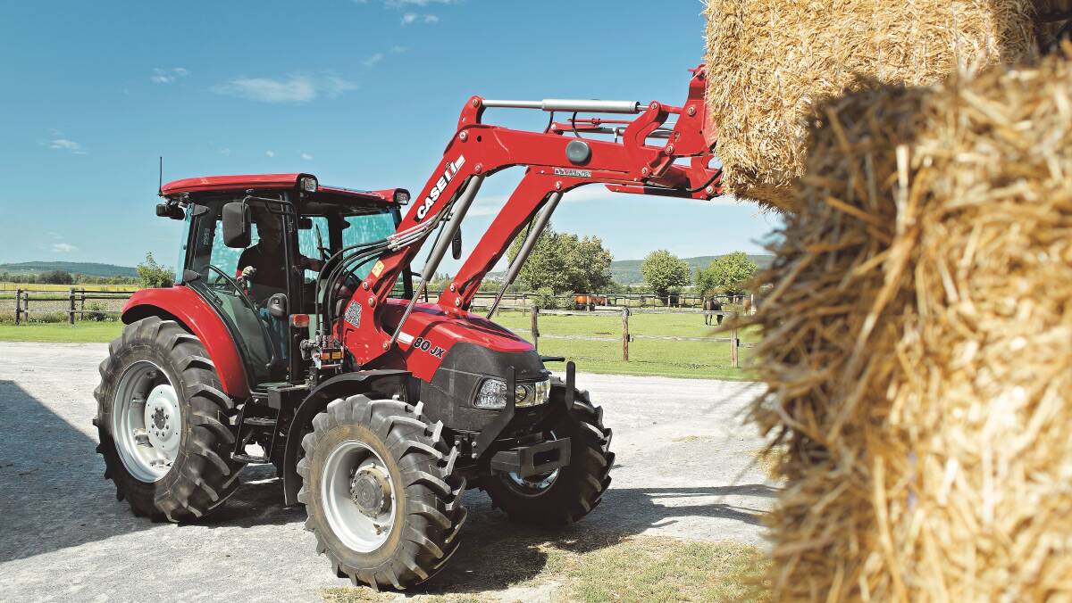 ALL ROUNDER: Utility tractors, such as the CaseIH Farmall JX80 pictured can be used to speed up drought feeding. The Farmall range is compatible with a range of loaders. 