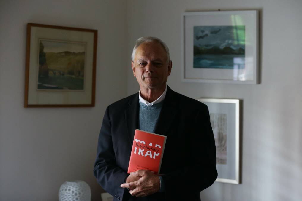 Population Peak: Laureate Professor John Aitken with his book, The Infertility Trap. "We will probably peak at a world population of around 10 billion people in the next 10 or 20 years. And then the population will start to reverse". Picture: Jonathan Carroll 