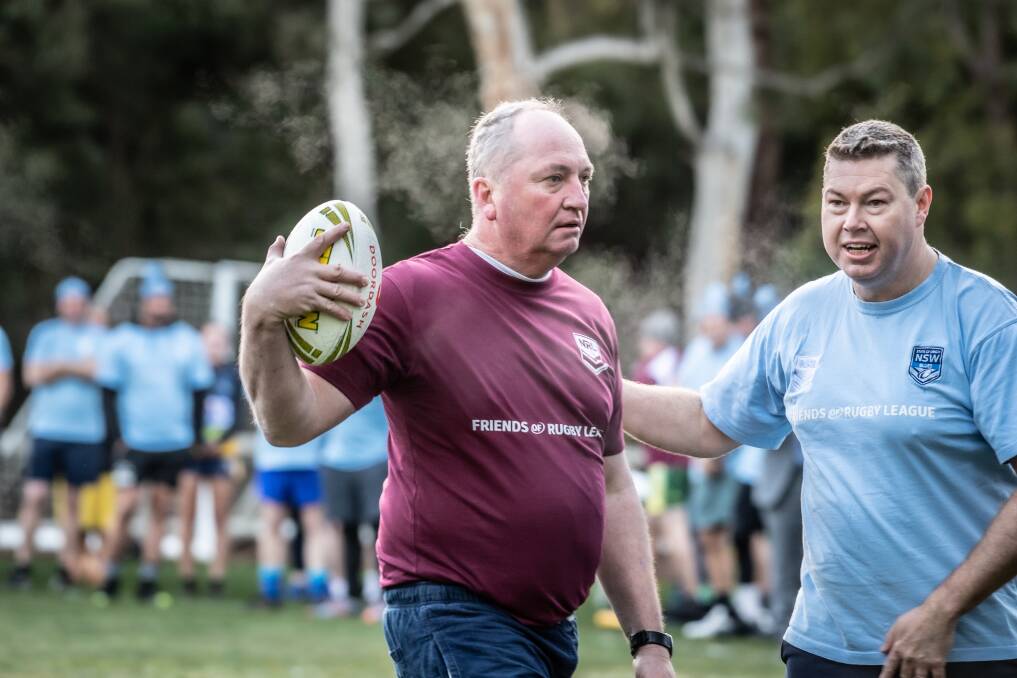 Parliamentarians including Barnaby Joyce battled it out in a touch football match in Canberra on Tuesday morning. Pictures by Karleen Minney