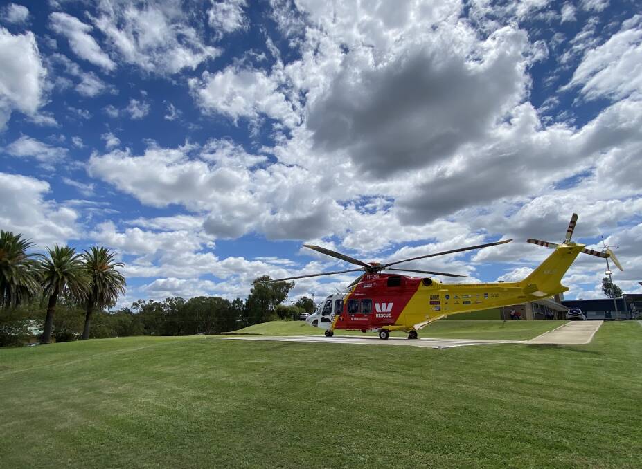 Emergency mission: The Westpac chopper on scene at Warialda hospital on Friday. Photo: Westpac Rescue Helicopter Service