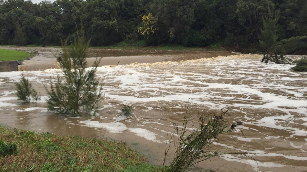 WATER FALLING: While the Maintyre River peaked at 2am this morning there is still plenty of run-off flowing over the weir near Captain Cook Drive in Inverell.