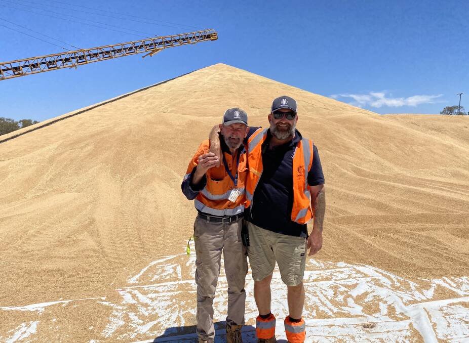 Donnie Krug, left, is enjoying working with his son Nathan, right at GrainCorp's Walgett site this harvest.