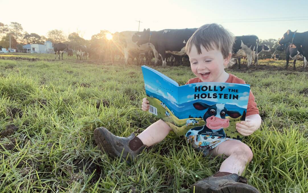 Albert Nicholson takes his copy of Holly the Holstein everywhere he goes on Jones Island farm. Photo supplied