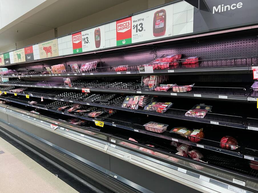 BARE: Shelves at Inverell's Woolworth's store show depleted supplies of meat. Photo: Jacinta Dickins