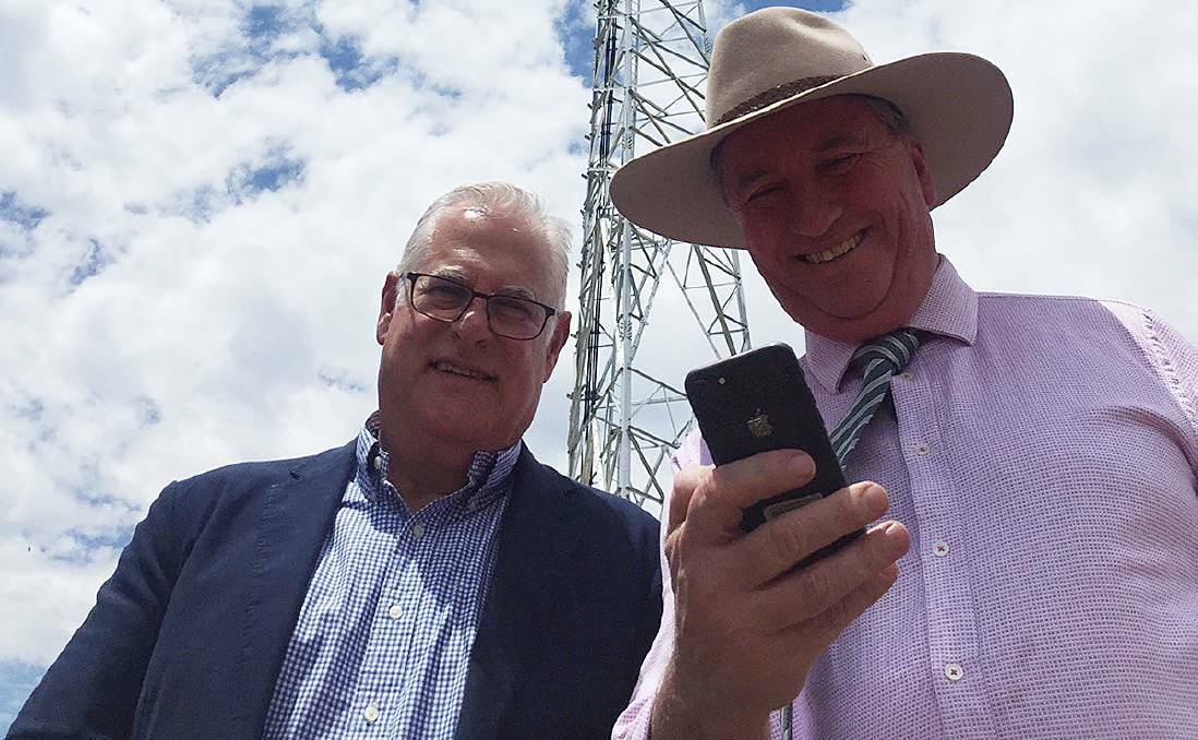 SPOT: Member for New England Barnaby Joyce (right) with Northern NSW Regional General Manager, Telstra Retail & Regional Australia, Mike Marom. Photo: Supplied