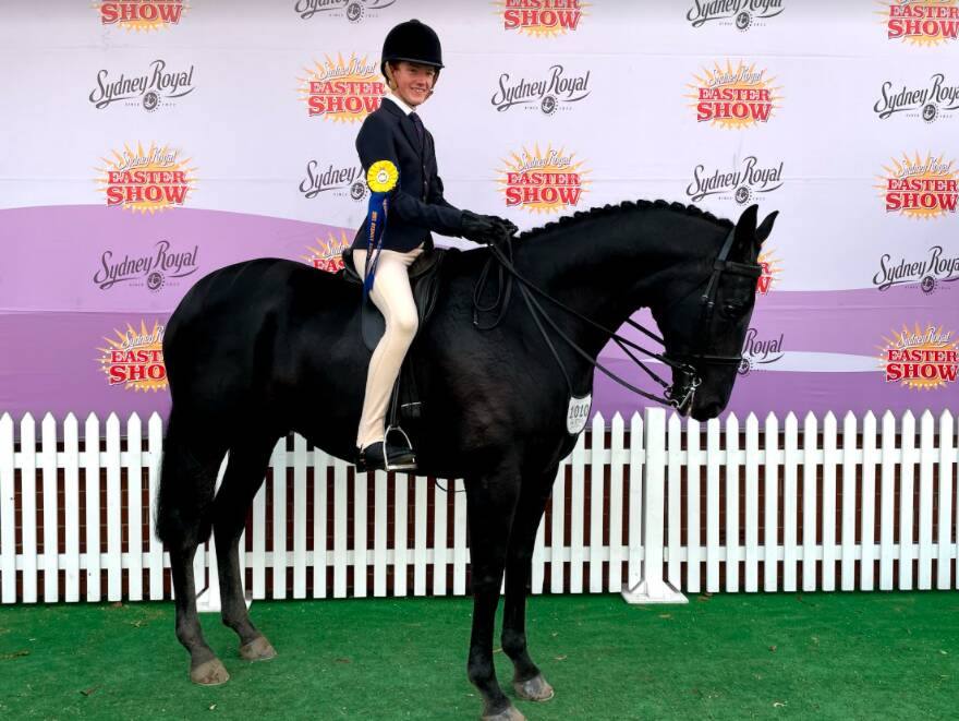PRIZE: Toby Adams on Wenona Lawson at the Sydney Royal Easter Show. Photo: Supplied