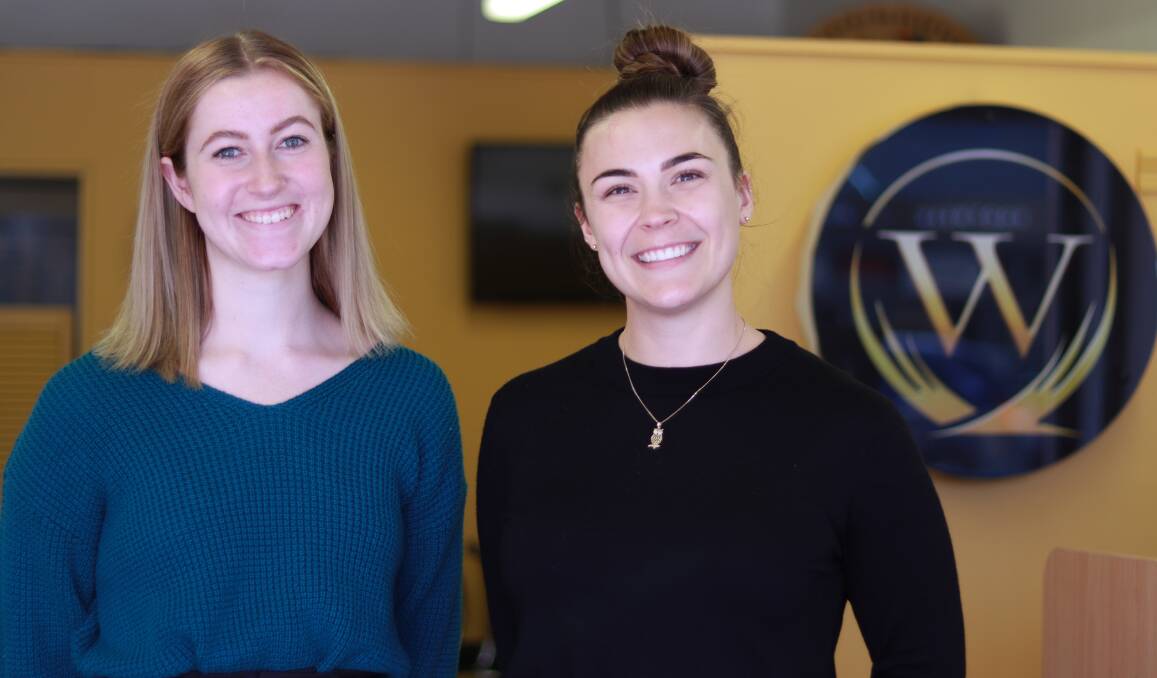 NEW TUNE: Amber Robinson and Marnie Wade from Windsong Travel are enjoying the increasing interest in travel again after a 'blur' from COVID-19. Photo: Jacinta Dickins
