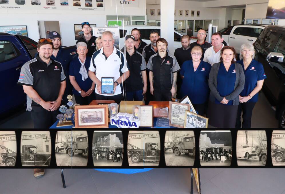 PROUD HISTORY: The Inverell NRMA Service Centre crew at Gaukroger's on Thursday, celebrating 90 years in town. Photo: Jacinta Dickins