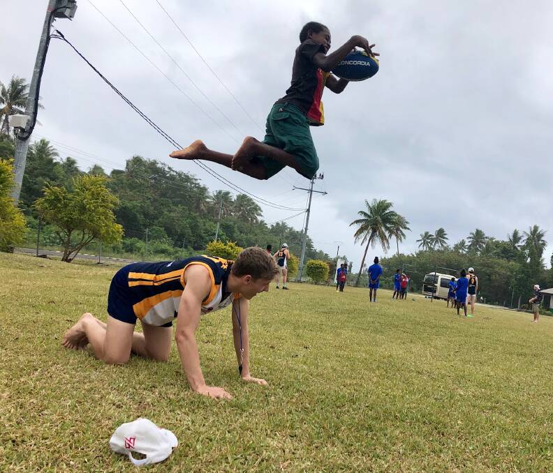 FLYING HIGH: AFL North West with other leagues across northern NSW, have entered a partnership with AFL Vanuatu, which will allow local players to tour overseas. Photo: Supplied 