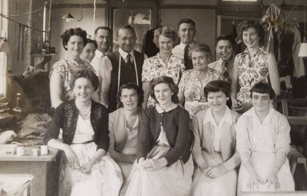 The late Betty Joan Cook far left, second row with her colleagues at Finlens Taylors 