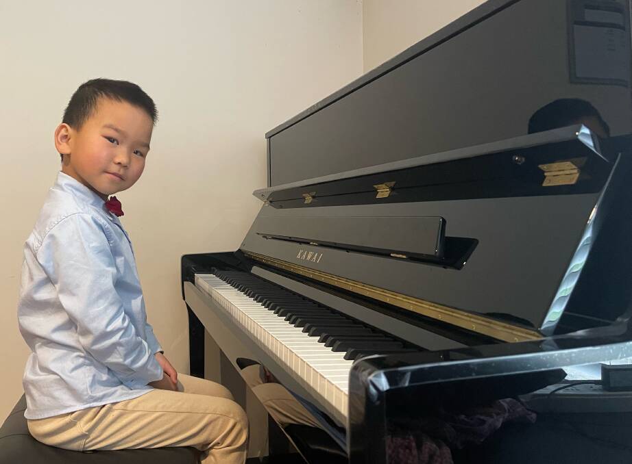 NATURAL TALENT: Kaison Hao is passionate about learning the piano. Picture: supplied.