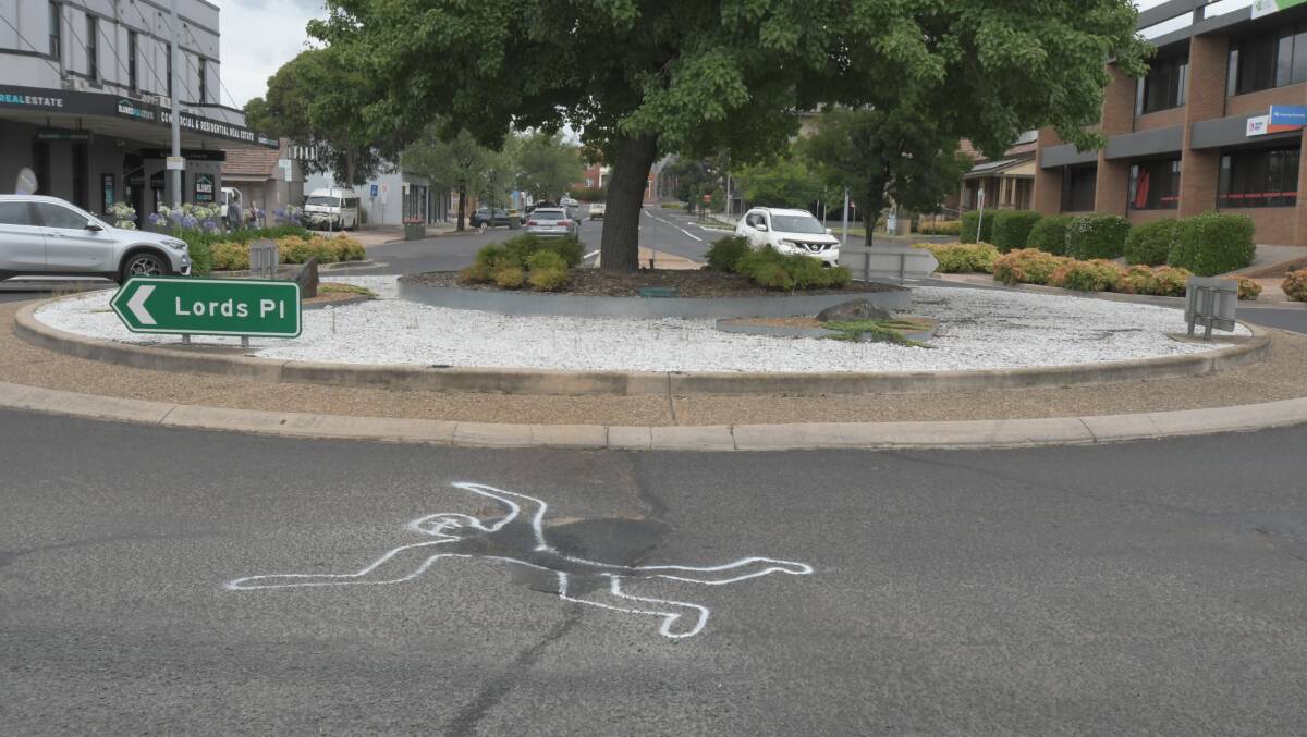 A similar outline is scene on a pothole on a roundabout on Lords Place and Kite Street. Photo: CARLA FREEDMAN