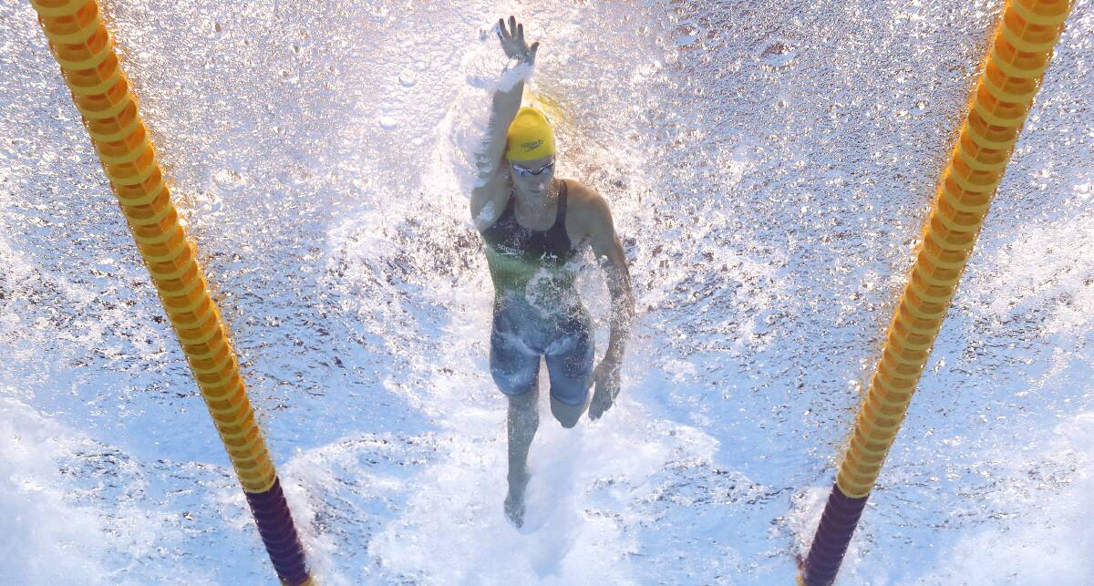 Racing: Emma McKeon on her way to gold in Tokyo. Picture: Getty Images