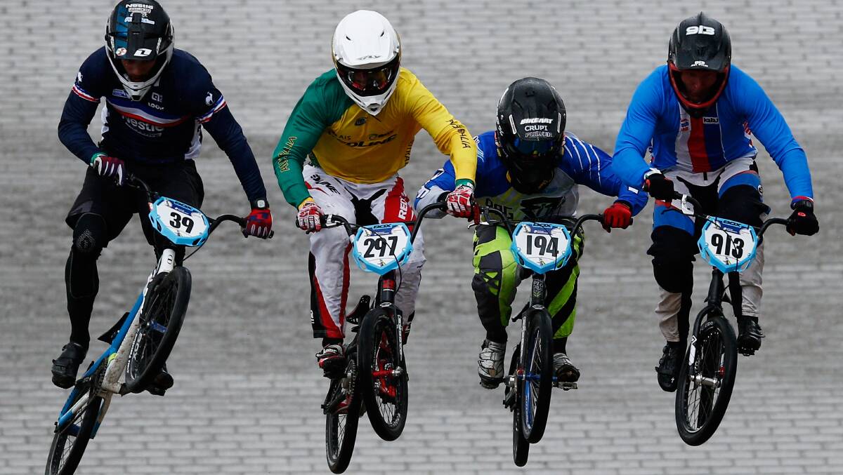 Racing towards a new goal: Kai Sakakibara (gold jersey) during his BMX career. Picture: Dean Mouhtaropoulos/Getty Images