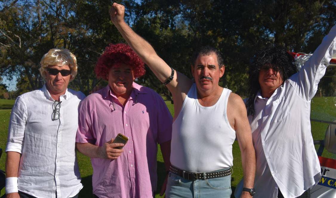 QUEEN: From left, Durell 'Roger Taylor' Hammond, Tony 'John Deacon' Bailey, Peter 'Freddie Mercury' Weal and Andrew 'Brian May' Parks at the charity golf day.