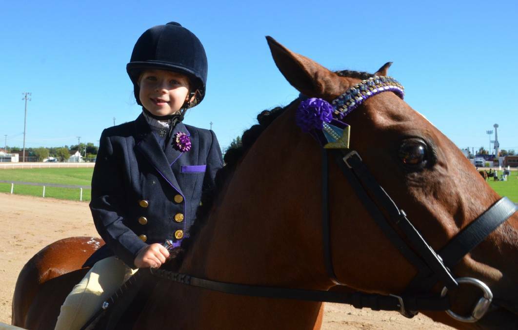 FLASHBACK: Nikita Owen proved herself a good sport in last year's equestrian events at the 149th annual show.