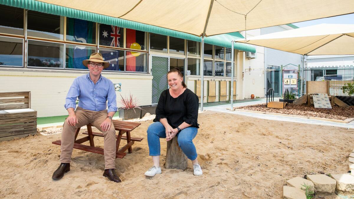 Northern Tablelands MP Adam Marshall and Inverell District Family Services CEO Nicky Lavender take some time out in the sandpit at the Bush Preschool, which is about to see some more shade provided for children.