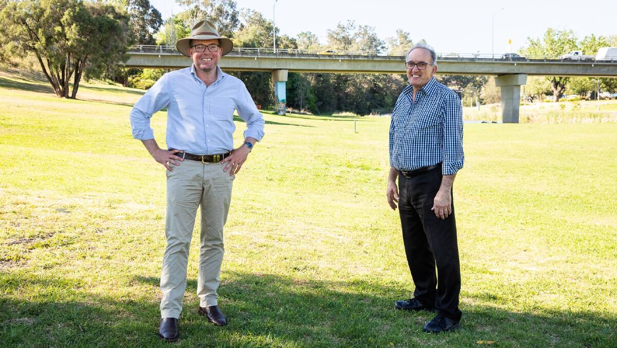 Northern Tablelands MP Adam Marshall with Inverell Shire Deputy Mayor Anthony Michael on the site where one of one of the new shared pathways will be constructed near Lions Park.