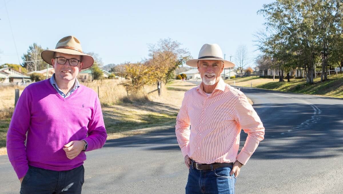 Northern Tablelands MP Adam Marshall, left, with Inverell Shire Mayor Paul Harmon inspect Old Bundarra Road, where the resealing work will get underway shortly.