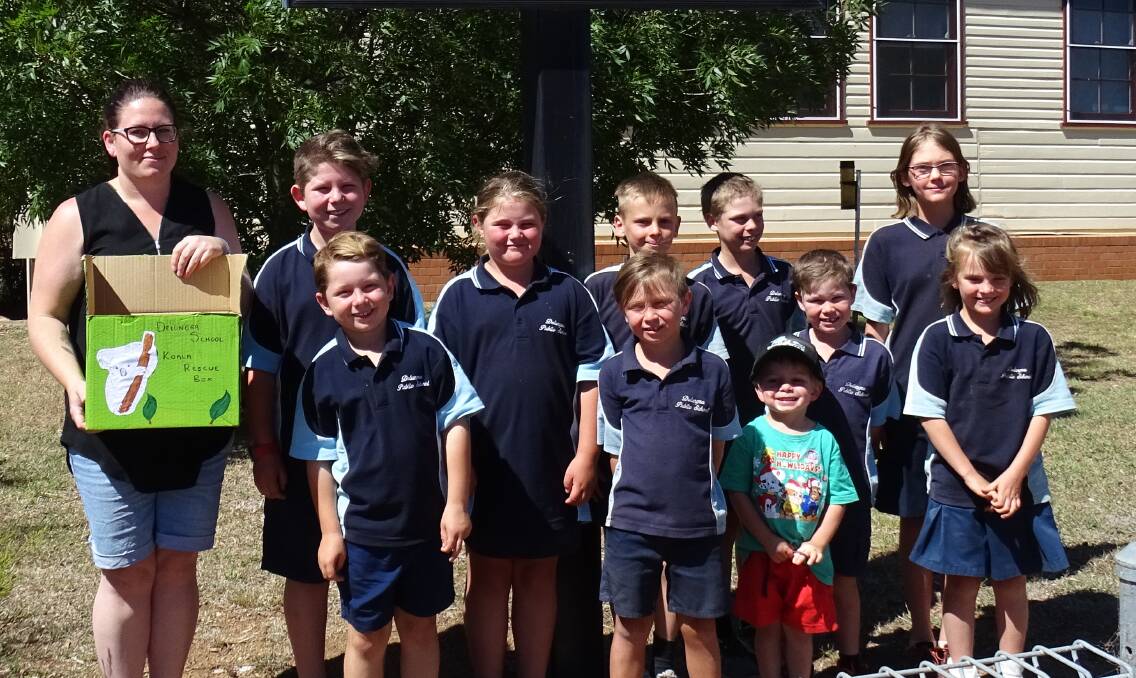 P&C President Nikki Murray with Delungra Public School students who are excited to help koala bushfire victims.