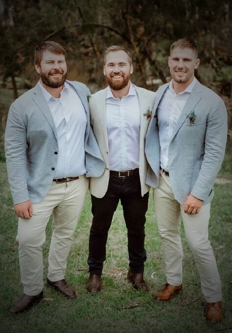 THE BOYS: Lewis with his his elder brothers, Mat and Mark, at Mark's wedding at Easter. Photo: Supplied