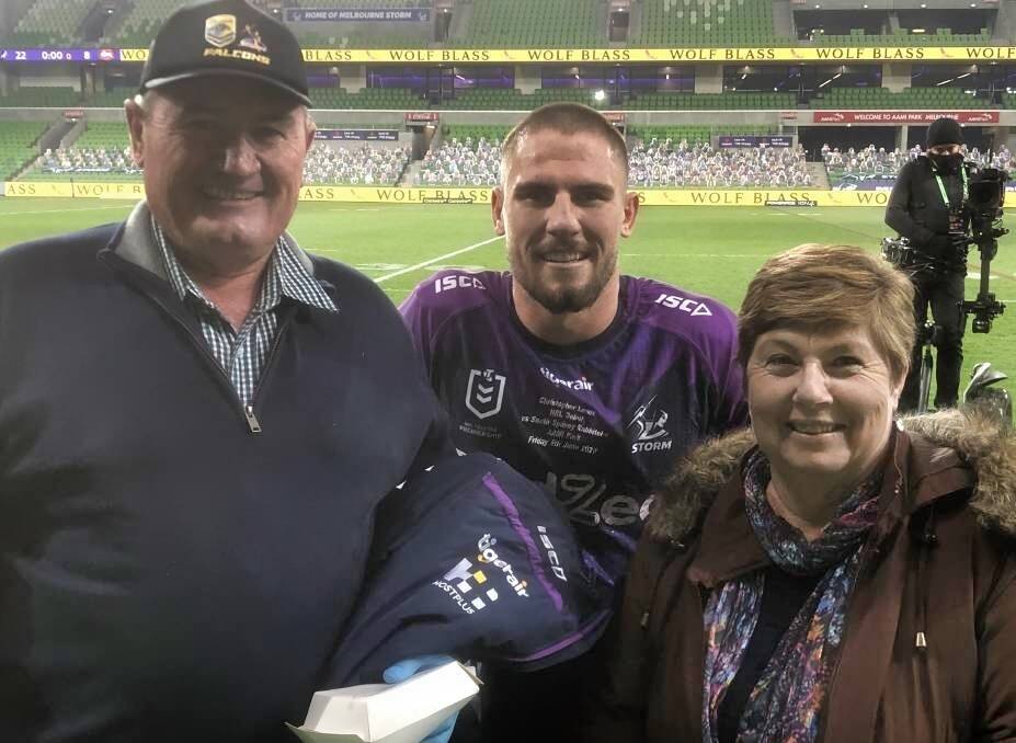 GOLDEN MEMORY: Chris Lewis with his dad and mum, Mick and Pauleen, at AAMI Park in Melbourne after making his NRL debut last year. Photo: Supplied