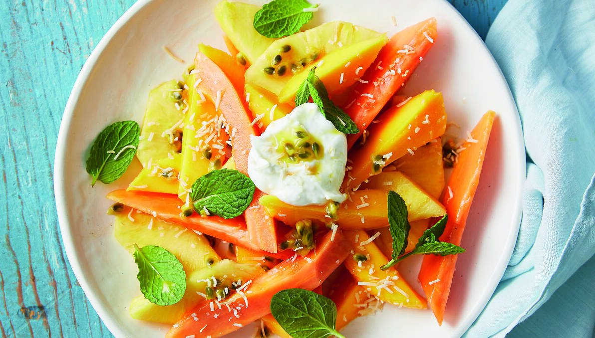 Tropical fruit salad with toasted coconut yoghurt. Picture: Supplied