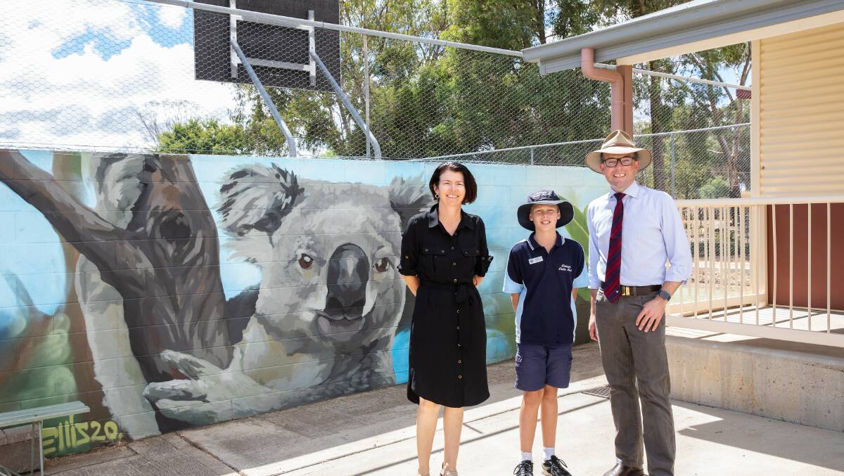 Delungra Public School Principal Toni Withers, left, student leader Lachlan Savage and MP Adam Marshall.
