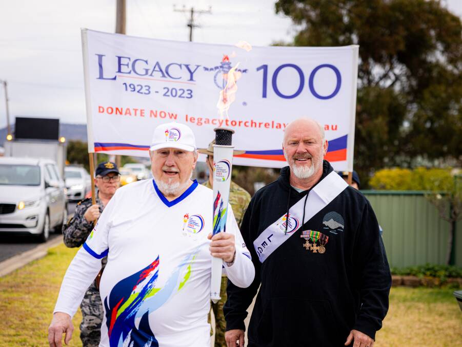 Stan Pianko was one of the torch bearers at the Legecy Centenary Torch Relay when it passed through Inverell on June 28. Picture by Csmith Photography.