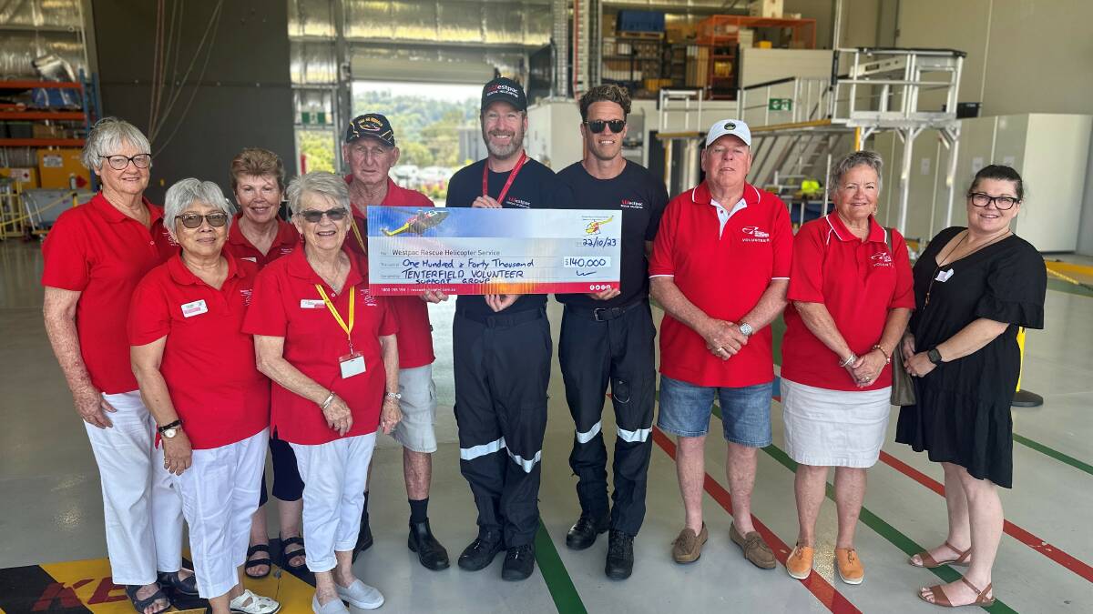 Members of the Westpac Rescue Helicopter Service support group from Tenterfield present staff with a cheque for $150,000. Picture supplied.