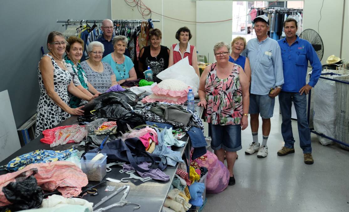 WELL-STAFFED: Part of the many volunteers on had at the clothing sorting table. 