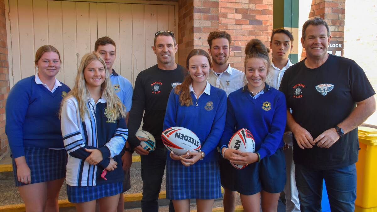 PROMOTING MENTAL HEALTH AWARENESS: Brad Fittler and Gus Worland with leaders from Glen Innes High School as part of NSWRL's Hogs tour. 