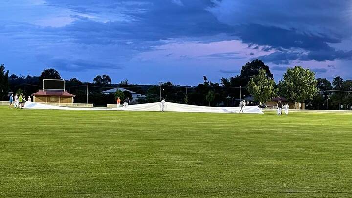 WASH OUT: The covers go on and the start of Inverell's cricket season is delayed. Photo: Inverell Cricket Association Facebook. 