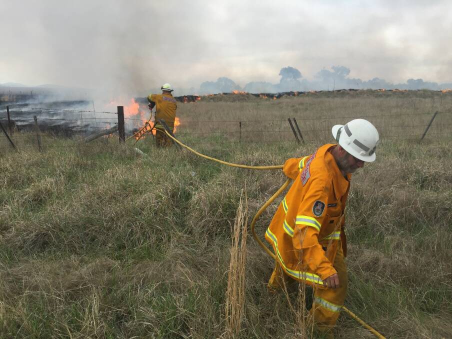 Control burn: Deepwater Rural Fire Service made use of the weather conditions to conduct hazard reduction burns alongside the small township. Photo: Heidi Gibson