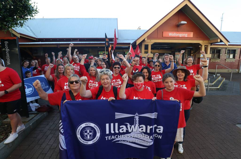 Teachers and supporters at Wollongong Train Station before departing for Sydney to join the strike action protest on Wednesday. Picture: Robert Peet