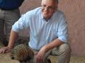 Prime Minister Scott Morrison poses with an echidna at the Alice Springs Desert Park. Picture: AAP