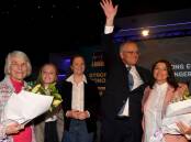 Prime Minister Scott Morrison, wife Jenny, daughters Lily and Abbey and mother Marion at a Liberal Party rally on Day 28 of the 2022 federal election campaign. Picture: AAP